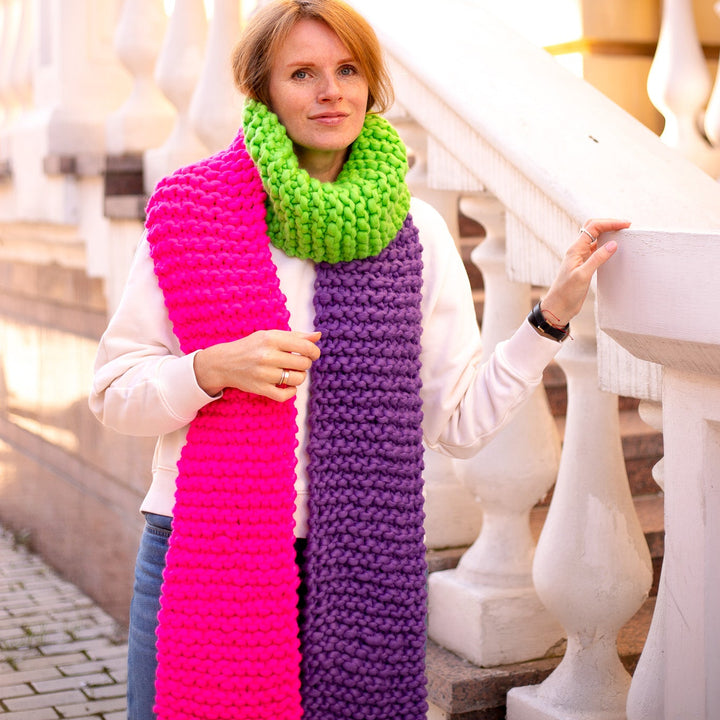Woman wearing a color block scarf 