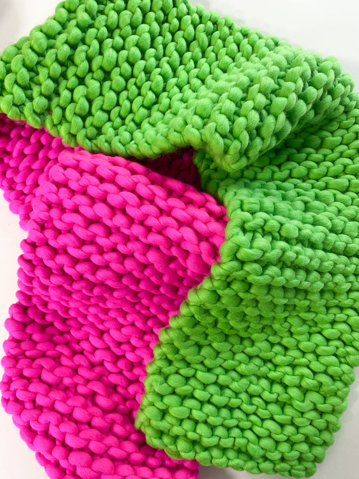 Colorful scarf in neon pink and green colors, made of soft Italian merino wool.