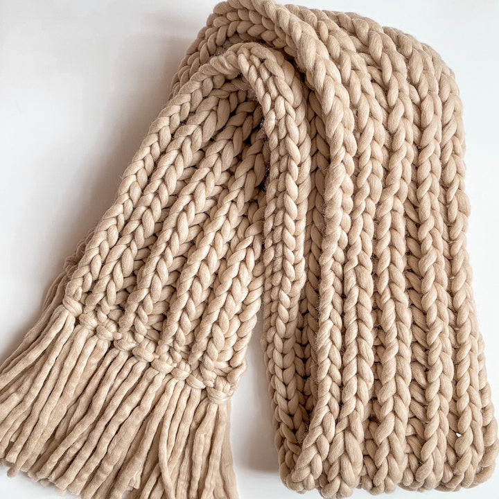 Beige chunky knit scarf with fringe