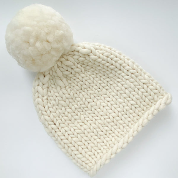 White bobble hat