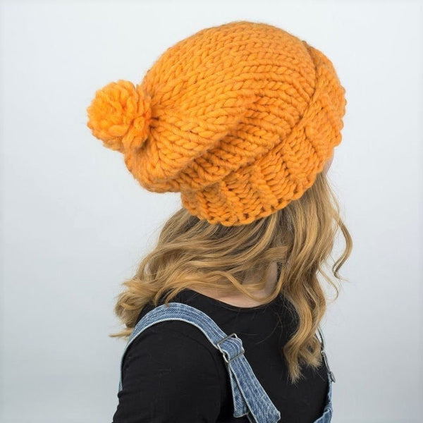 Knitted slouchy beanie with pom pom