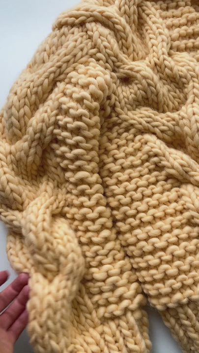 Chunky wool cable cardigan detail video