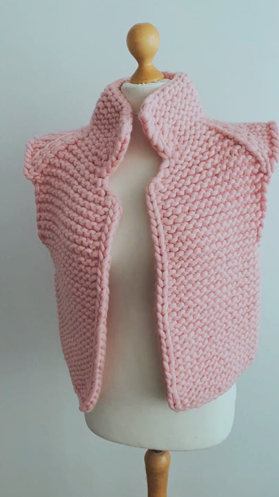 Chunky knit vest in pink merino wool styled on mannequin video